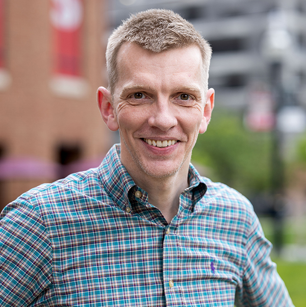 A portrait of Ohio State College of Arts and Sciences professor Angus Fletcher