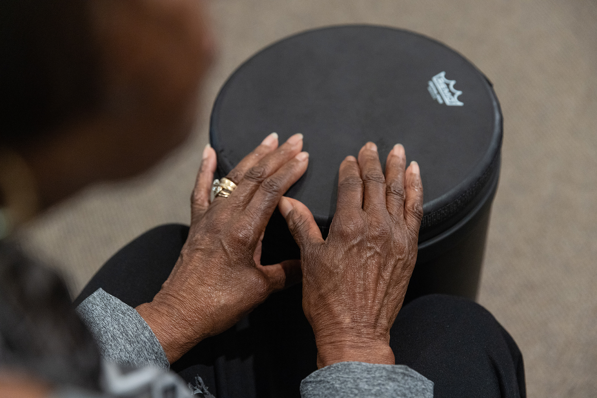 Ruthie Clemon's hands on a drum