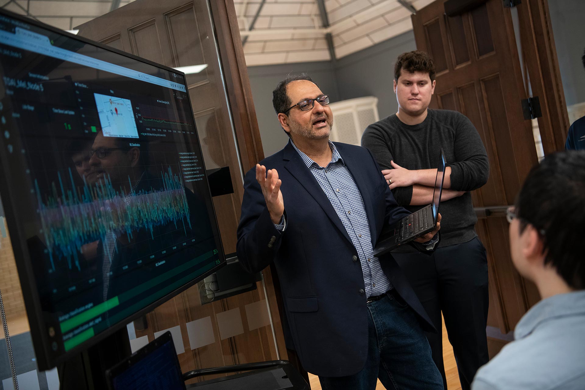 Ness Shroff working with students