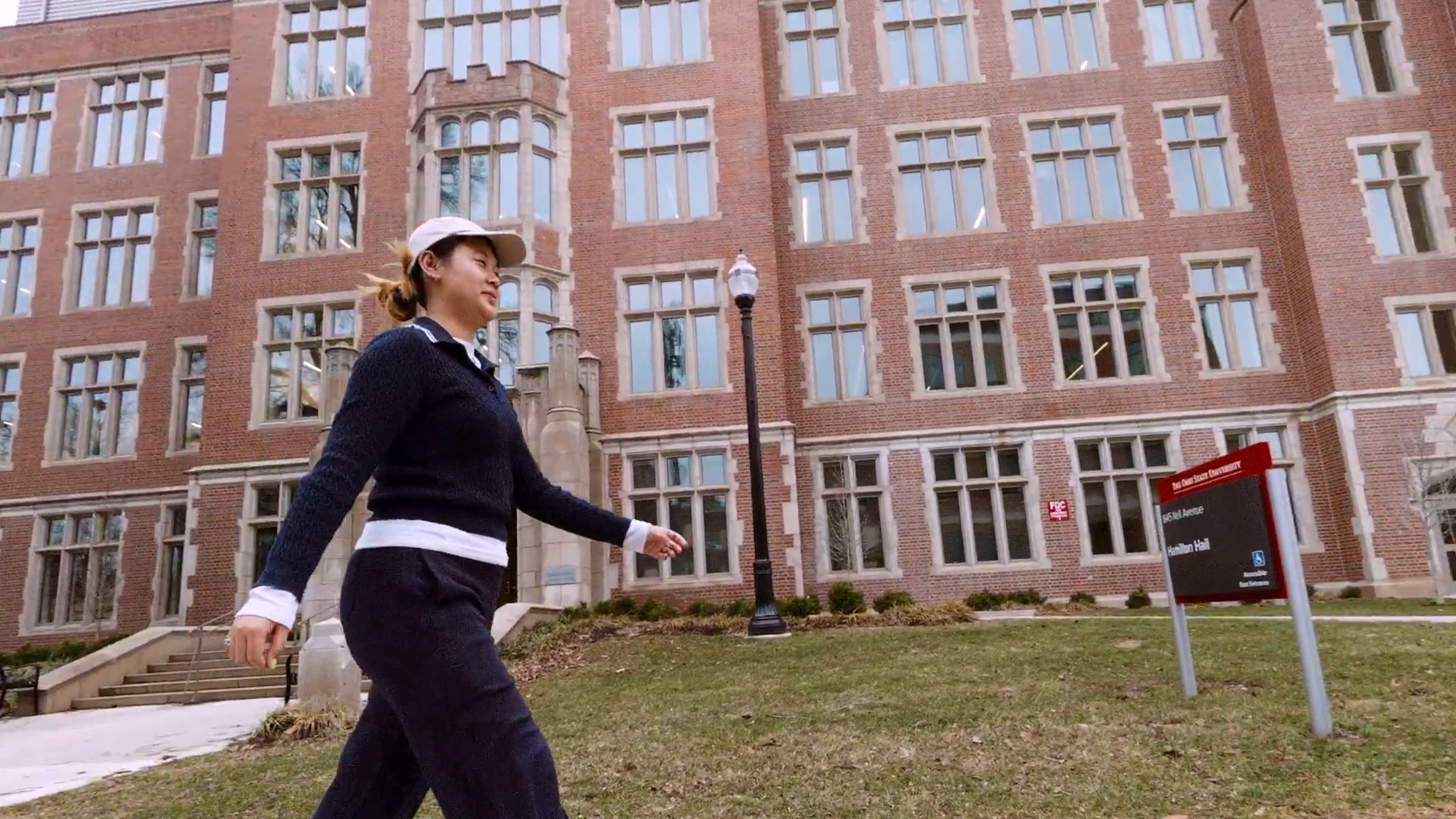 Arina Xiong walks across Ohio State's campus