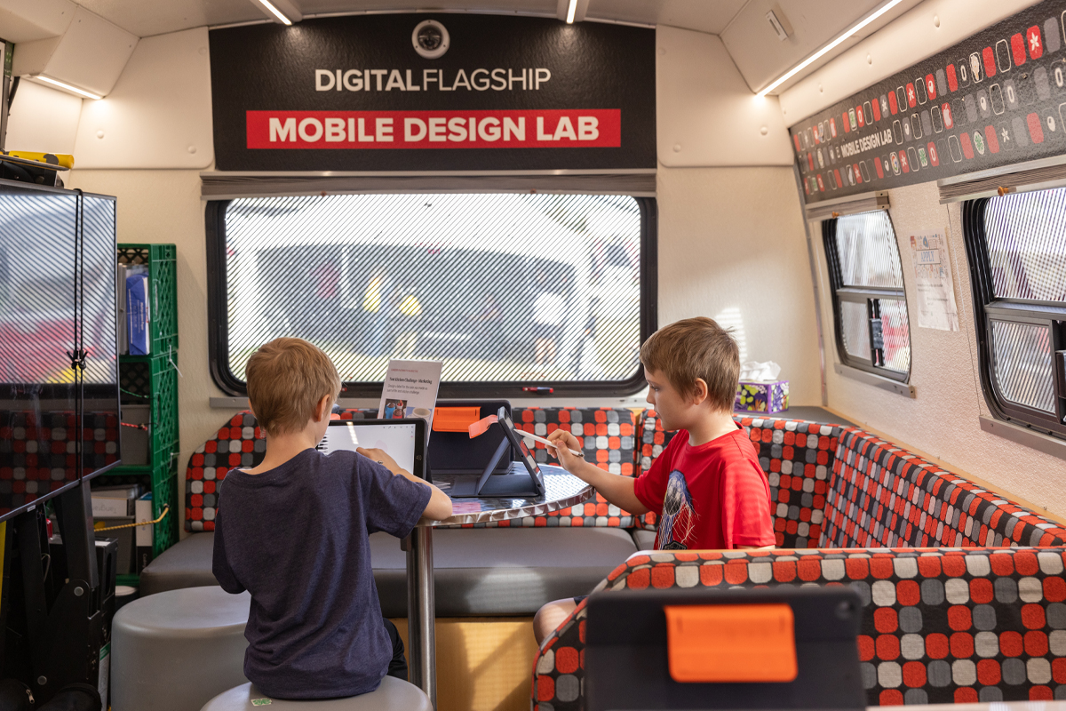 Young students learning in the mobile design lab