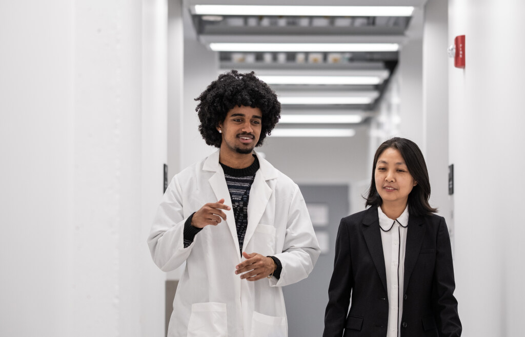 Emanuel Tewolde talks with his professor Min-Ae Song.