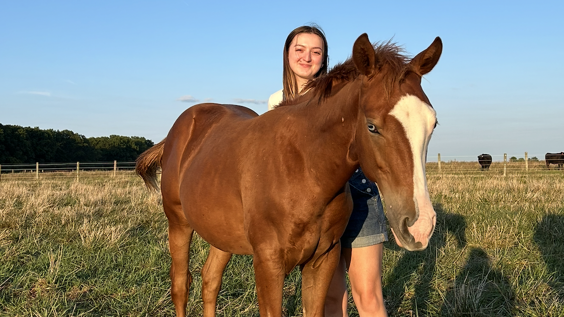 Ella Higgins with a horse